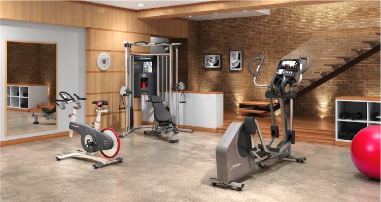 Exercise machine,Gym,Exercise equipment,Room,Elliptical trainer,Sport venue,Physical fitness,Basement,Weightlifting machine,Sports equipment