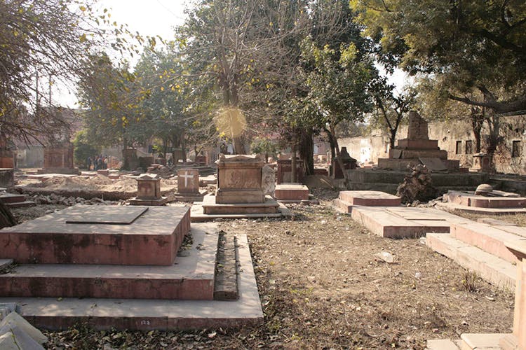 Grave,Cemetery,Headstone,Tree,Architecture,Historic site,Temple,Plant,Building,Tomb
