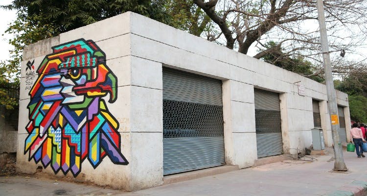 Street art,Graffiti,Art,Mural,Wall,Facade,Architecture,Building,Visual arts,Concrete