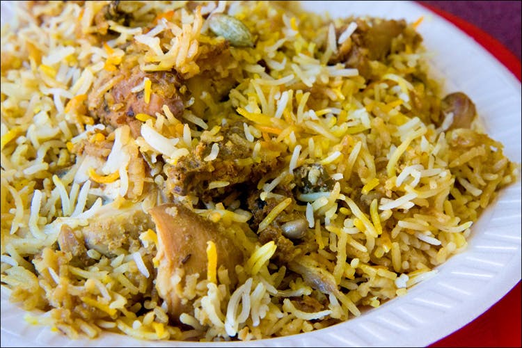 Dish,Spiced rice,Food,Cuisine,Puliyogare,Biryani,Ingredient,Hyderabadi biriyani,Kabsa,Rice