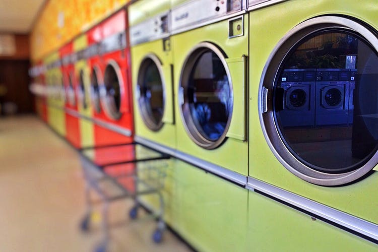 Major appliance,Yellow,Laundry,Transport,Washing machine,Clothes dryer,Vehicle,Home appliance,Machine,Wheel