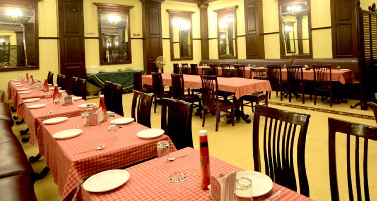 Restaurant,Building,Room,Function hall,Table,Interior design,Banquet,Business,Café,Organization