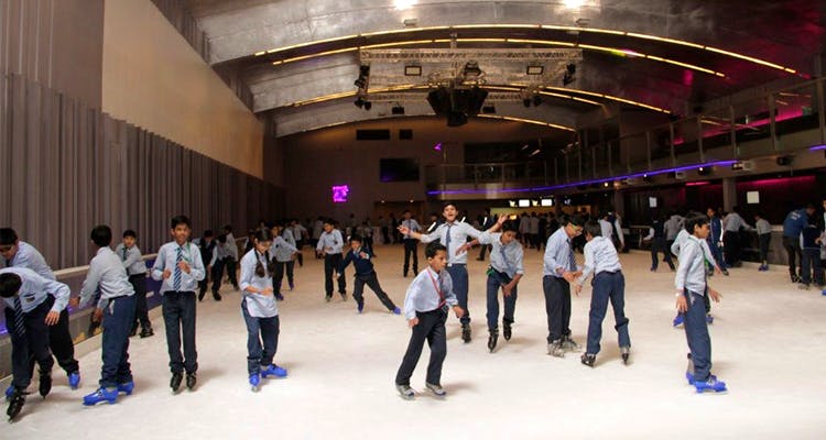 Ice rink,Ice skating,Event,Skating,Dance,Footwear,Recreation,Choreography,Sports,Building