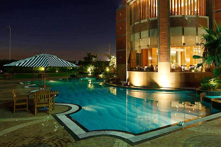 Swimming pool,Resort,Property,Building,Hotel,Lighting,Leisure,Architecture,Resort town,Real estate