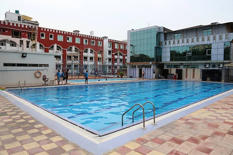 Swimming pool,Property,Leisure centre,Building,Condominium,Leisure,Town,Real estate,Resort,Apartment