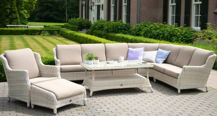 Furniture,Couch,Living room,Wicker,Coffee table,Patio,Room,Table,Sofa bed,Outdoor furniture