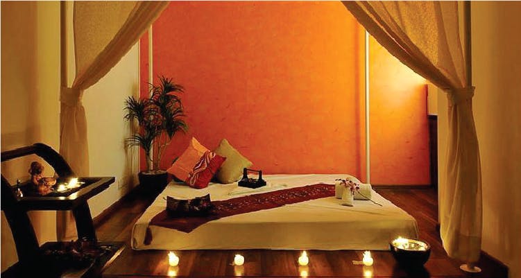 Room,Massage table,Bedroom,Furniture,Interior design,Bed,Boutique hotel,Comfort,House