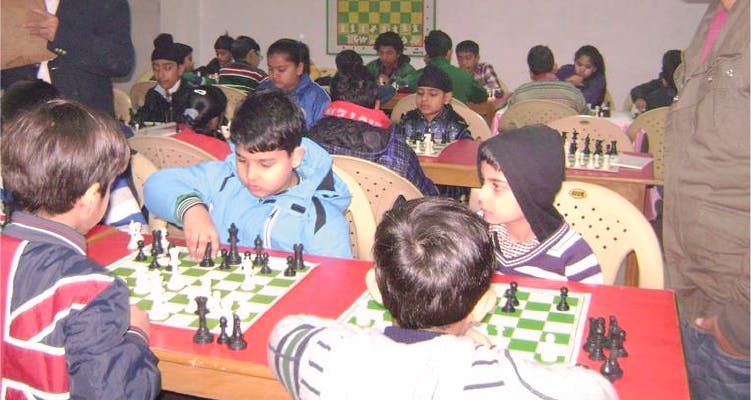 Indoor games and sports,Games,Chess,Board game,Chessboard,Tabletop game,Recreation,Community,Championship,Event
