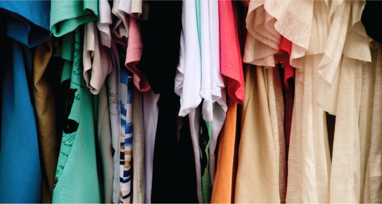 Closet,Clothing,Clothes hanger,Room,Textile,Dress,Wardrobe,Linens,T-shirt,Boutique