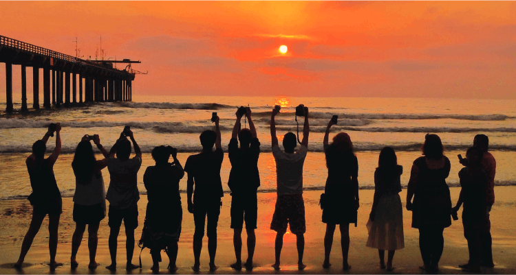 People on beach,Sunset,Sky,Sunrise,Horizon,Evening,Beach,Sea,Ocean,Afterglow