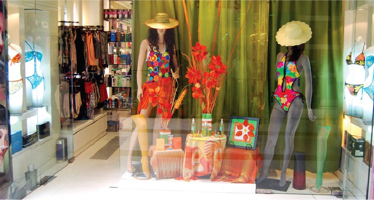 Display window,Boutique,Display case,Textile,Temple,Retail,Visual arts,Art,Fashion design