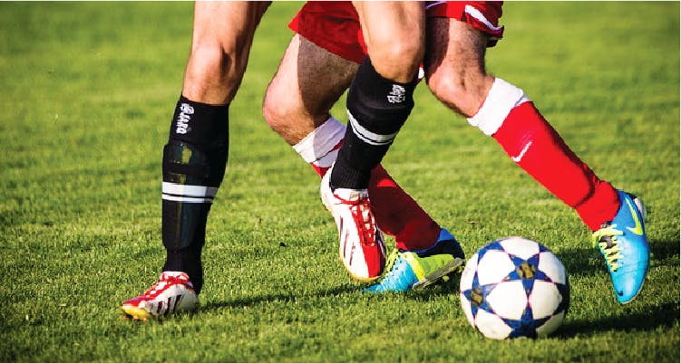 Soccer ball,Sports equipment,Football,Ball game,Player,Ball,Football player,Soccer player,Soccer,Sports