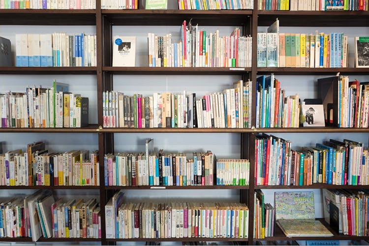 Bookcase,Shelving,Shelf,Book,Library,Publication,Furniture,Bookselling,Public library,Building