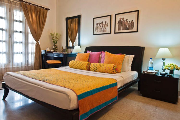 Bedroom,Furniture,Bed,Room,Property,Interior design,Bed sheet,Bed frame,Mattress,Wall