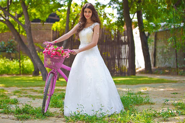 Bride,Wedding dress,Dress,Gown,Photograph,Clothing,Bridal clothing,Bridal party dress,Lady,Ceremony