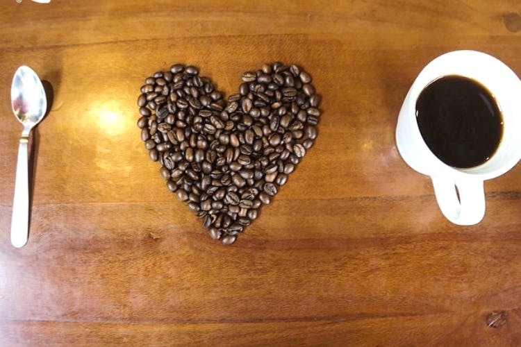 Heart,Spoon,Coffee cup,Caffeine,Tableware,Cup,Placemat,Cutlery,Food,Caffè americano