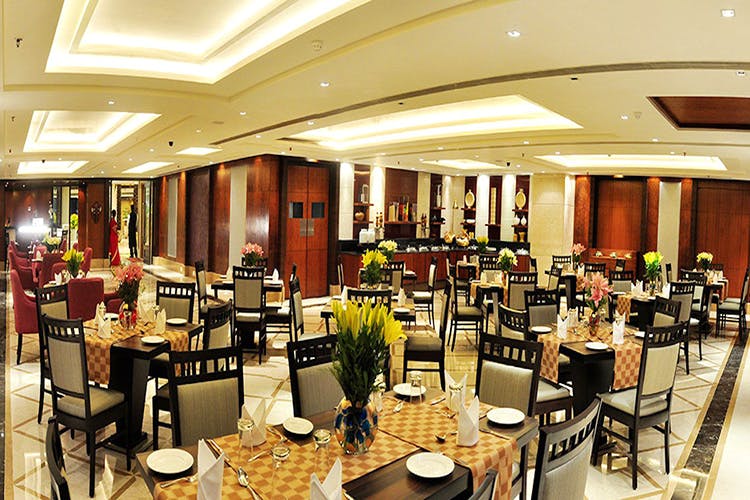 Restaurant,Building,Interior design,Room,Cafeteria,Café,Table,Dining room,Business,Hotel