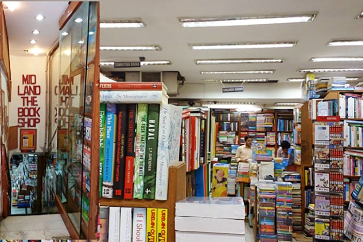 Bookselling,Retail,Building,Library,Public library,Book,Bookcase,Publication,Shelving,Shelf