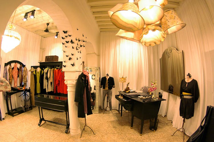 Boutique,Room,Interior design,Suit,Building,Event,Photography