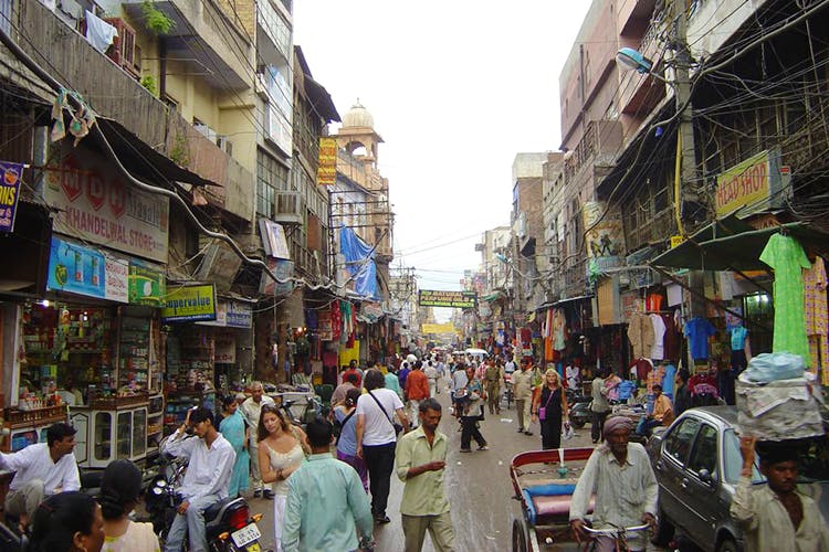 Bazaar,Marketplace,Market,Town,City,Street,Public space,Human settlement,Neighbourhood,Building