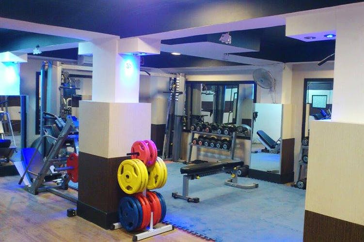 Gym,Room,Physical fitness,Sport venue,Property,Leisure centre,Exercise,Interior design,Leisure,Weight training