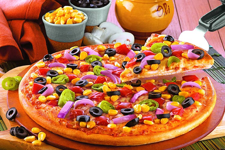Dish,Food,Cuisine,Pizza,Ingredient,California-style pizza,Fast food,Pizza cheese,Produce,Junk food