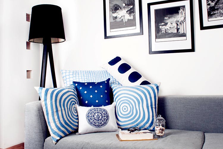 Blue,Cobalt blue,Furniture,Black,Room,Living room,Interior design,Lampshade,Wall,Couch