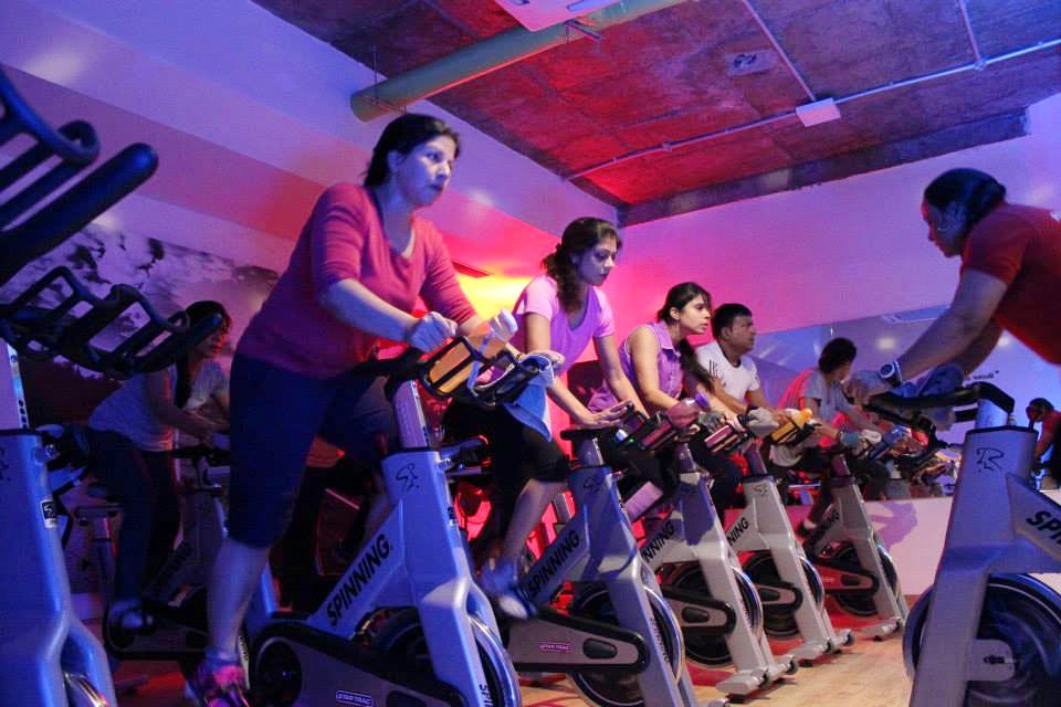 Indoor cycling,Performance,Event,Exercise,Room,Fun,Performing arts,Leisure,Dance,Crowd