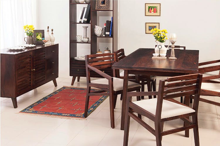 Furniture,Room,Dining room,Table,Kitchen & dining room table,Interior design,Chair,Floor,Coffee table,Flooring