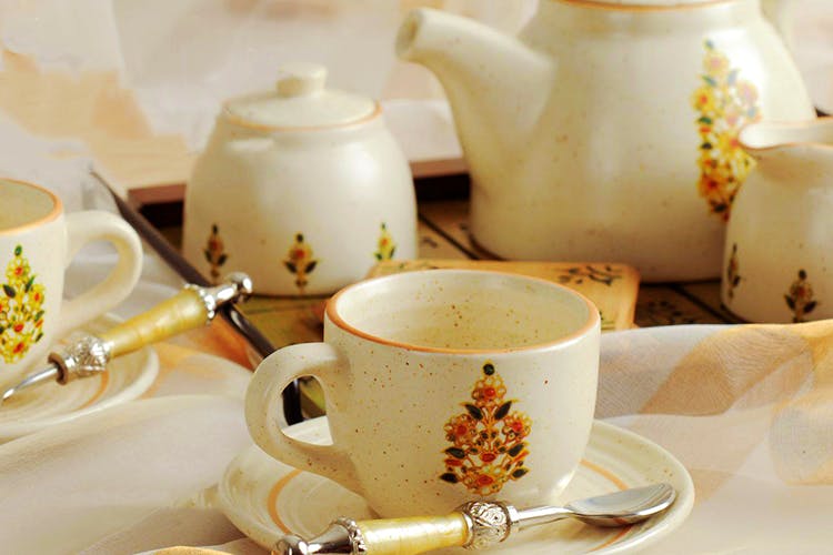 Porcelain,Cup,Coffee cup,Tableware,Teapot,Serveware,Ceramic,Cup,Saucer,Dishware