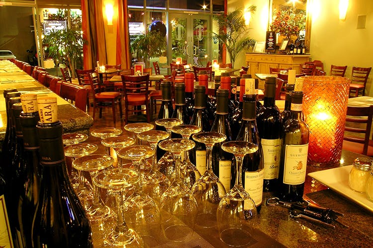 Barware,Bottle,Wine bottle,Drinkware,Drink,Bar,Drinking establishment,Glass bottle,Restaurant,Alcoholic beverage