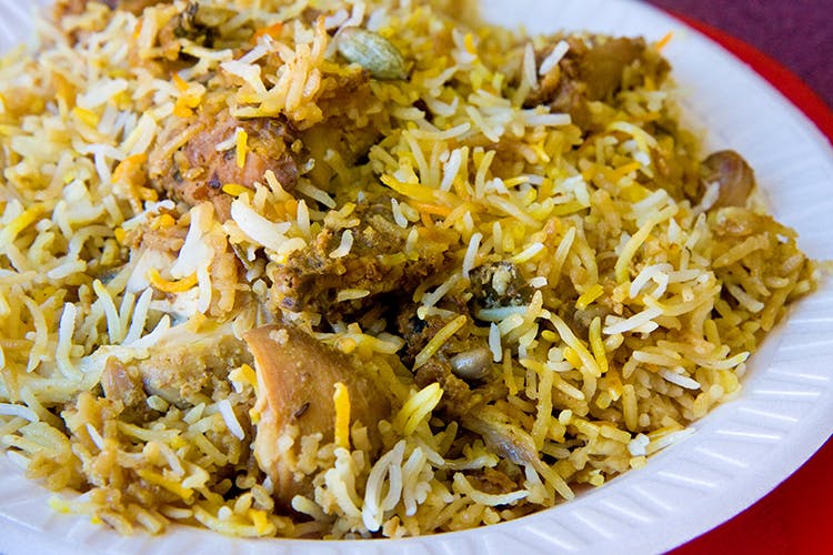 Dish,Cuisine,Spiced rice,Food,Puliyogare,Ingredient,Hyderabadi biriyani,Biryani,Kabsa,Rice
