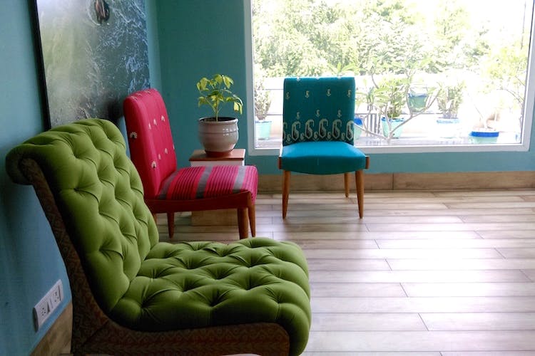 Furniture,Green,Room,Property,Chair,Living room,Interior design,House,Couch,Floor