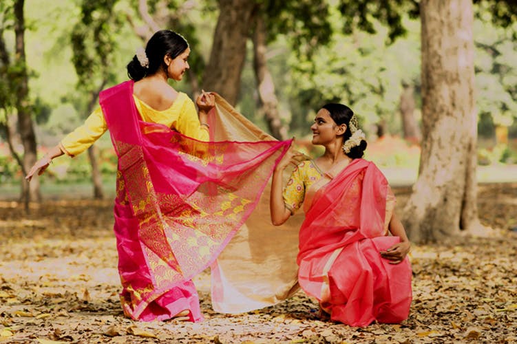 People in nature,Pink,Sari,Yellow,Tree,Tradition,Photography,Abdomen,Plant,Magenta