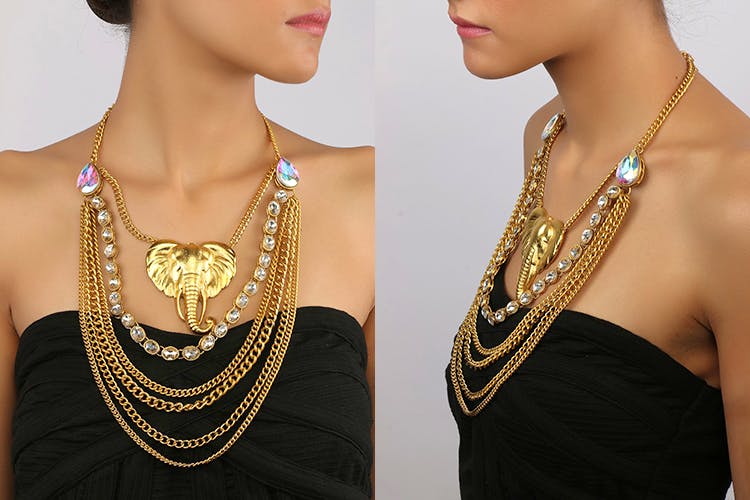 Chain,Necklace,Jewellery,Body jewelry,Fashion accessory,Neck,Metal,Fashion design,Gold