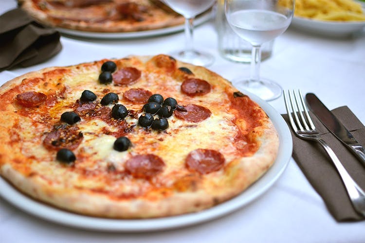 Dish,Food,Cuisine,Pizza,Ingredient,Pizza cheese,Flatbread,Dessert,Italian food,Produce