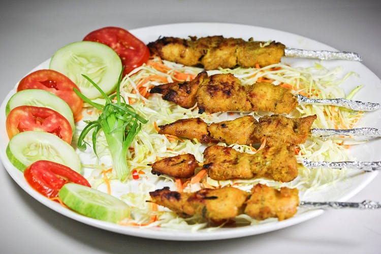 Dish,Food,Cuisine,Ingredient,Shish taouk,Meat,Kebab,Fried food,Chicken tikka,Souvlaki