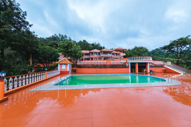 Swimming pool,Leisure,Resort town,Leisure centre,Resort,Building,Thermae,Hacienda