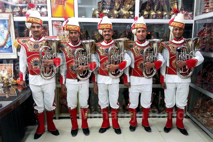 Marching band,Team,Musical instrument,Musician,Musical ensemble,Brass instrument,Horn,Uniform
