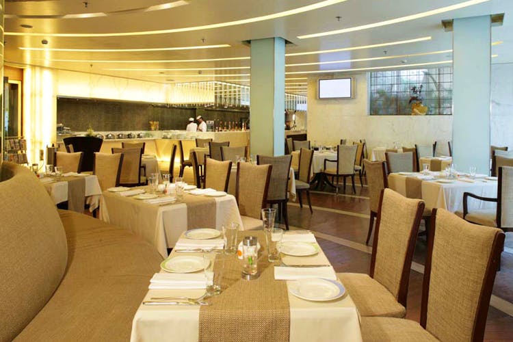 Restaurant,Property,Room,Building,Function hall,Interior design,Banquet,Table,Furniture,Business