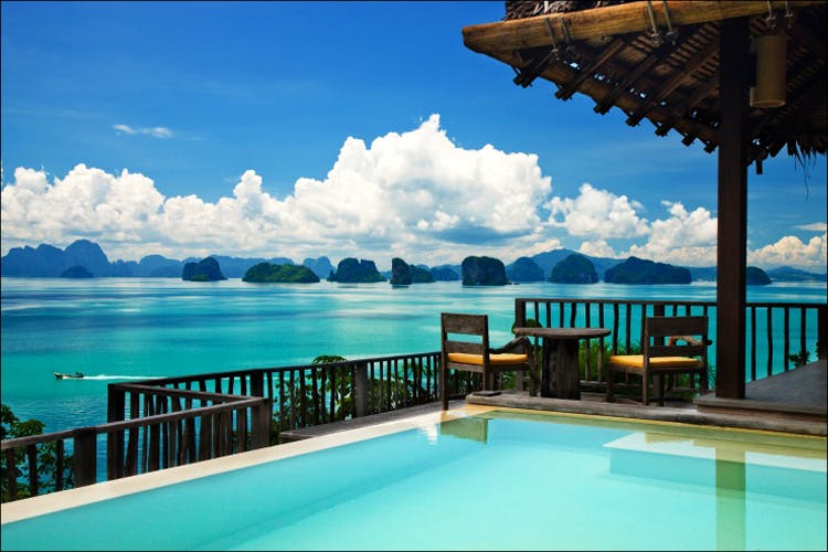 Resort,Sky,Property,Blue,Caribbean,Swimming pool,Vacation,Ocean,Azure,Tropics