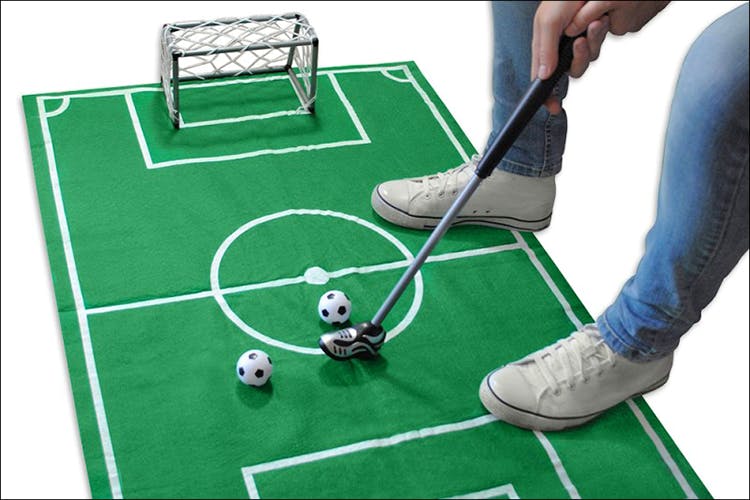 Table,Games,Grass,Sport venue,Play,Recreation,Sports equipment,Field hockey,Furniture