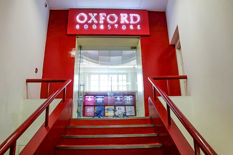 Red,Building,Stairs,Architecture,Room,Interior design,Flooring,Handrail