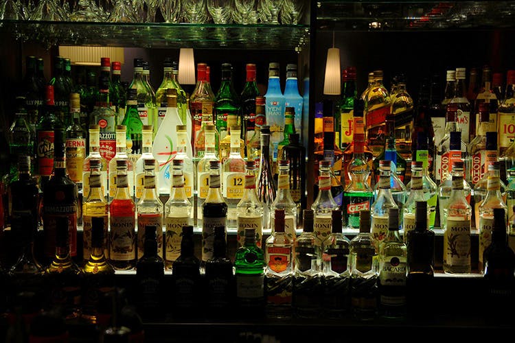Alcohol,Bar,Glass bottle,Bottle,Drink,Liqueur,Distilled beverage,Pub,Alcoholic beverage,Barware