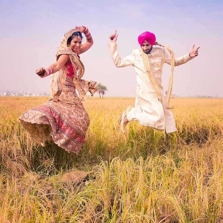 People in nature,Grassland,Fun,Yellow,Grass,Happy,Grass family,Sky,Pink,Prairie