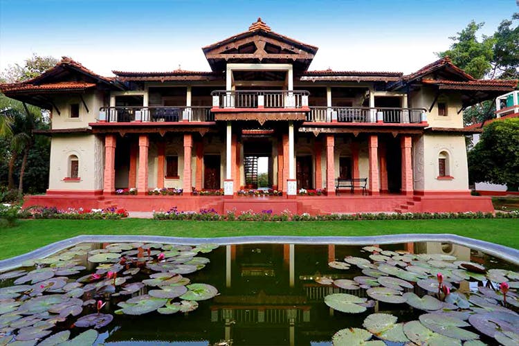 Building,House,Architecture,Estate,Property,Chinese architecture,Botany,Reflecting pool,Mansion,Villa