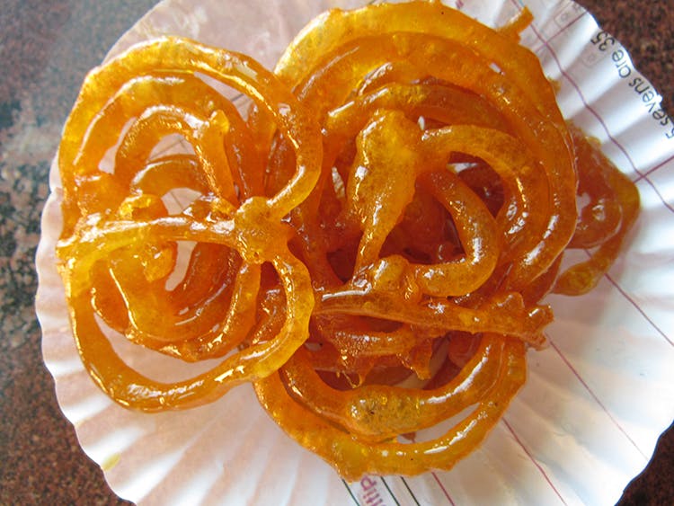 Food,Cuisine,Dish,Candied fruit,Ingredient,Jalebi,Vegetarian food,Produce,Orange,Citrus