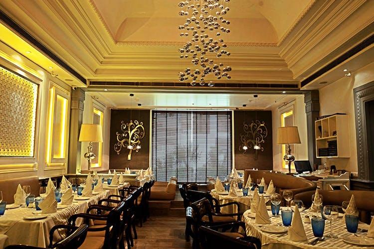 Restaurant,Function hall,Building,Room,Interior design,Dining room,Ceiling,Architecture,Table,Ballroom