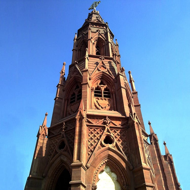 Landmark,Spire,Steeple,Architecture,Tower,Place of worship,Building,Sky,Church,Medieval architecture