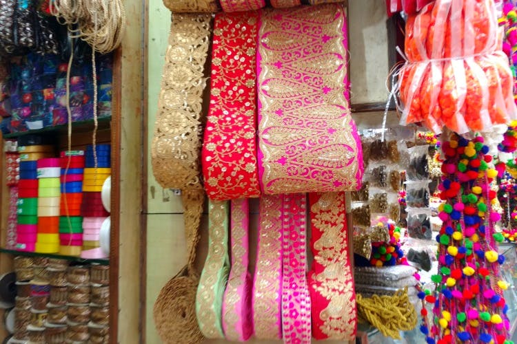 Pink,Textile,Fashion accessory,Market,Bangle